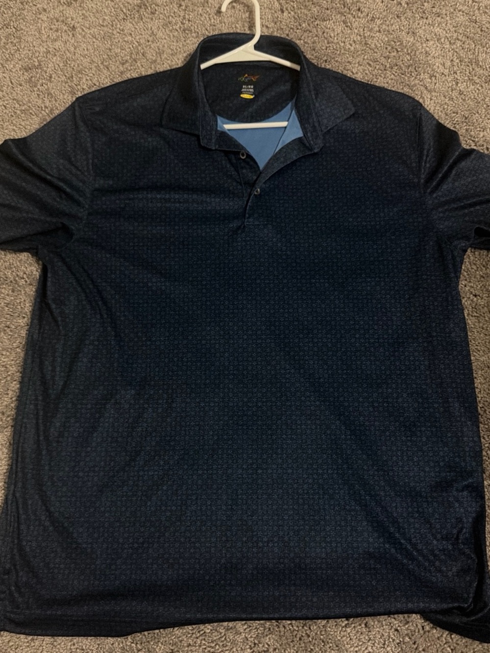 Greg Norman Collection Men's Dark Navy Polo with Subtle Pattern